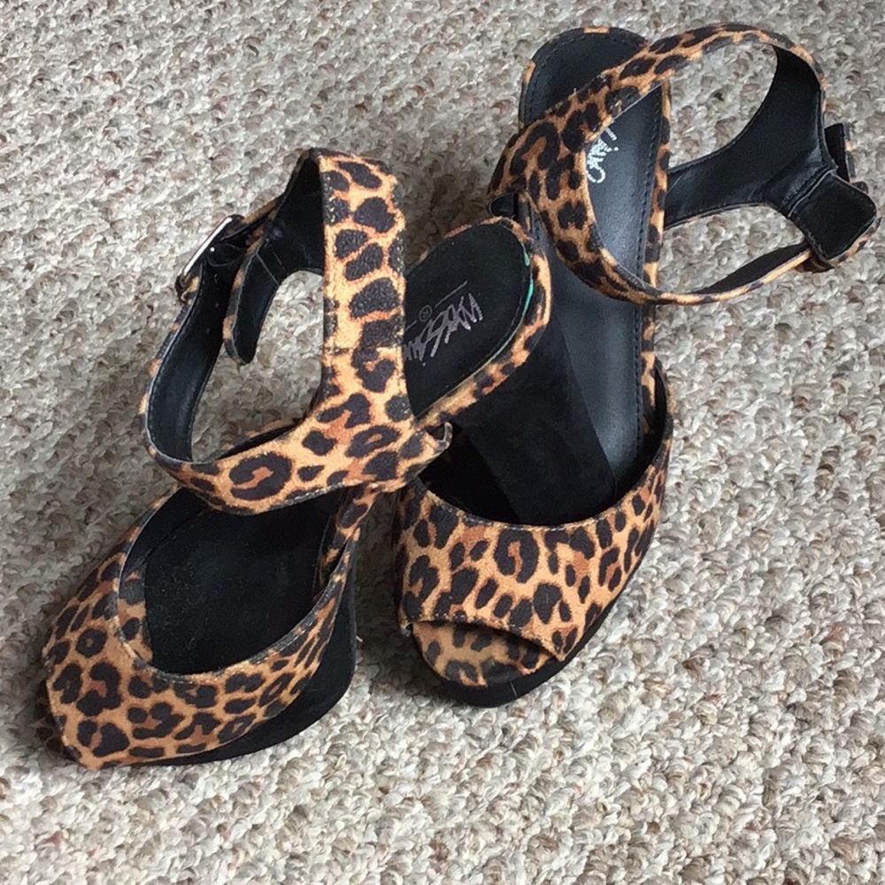 Woman’s leopard skin high heel shoes